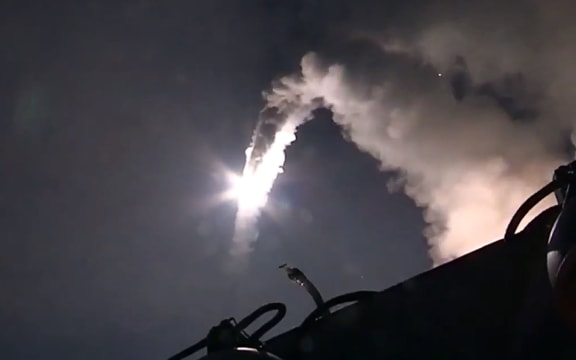 An image grab from a video released by the Russian Defence Ministry shows a Russian warship launching a cruise missile in the Caspian Sea during a strike against Islamic State (IS) in Syria.
