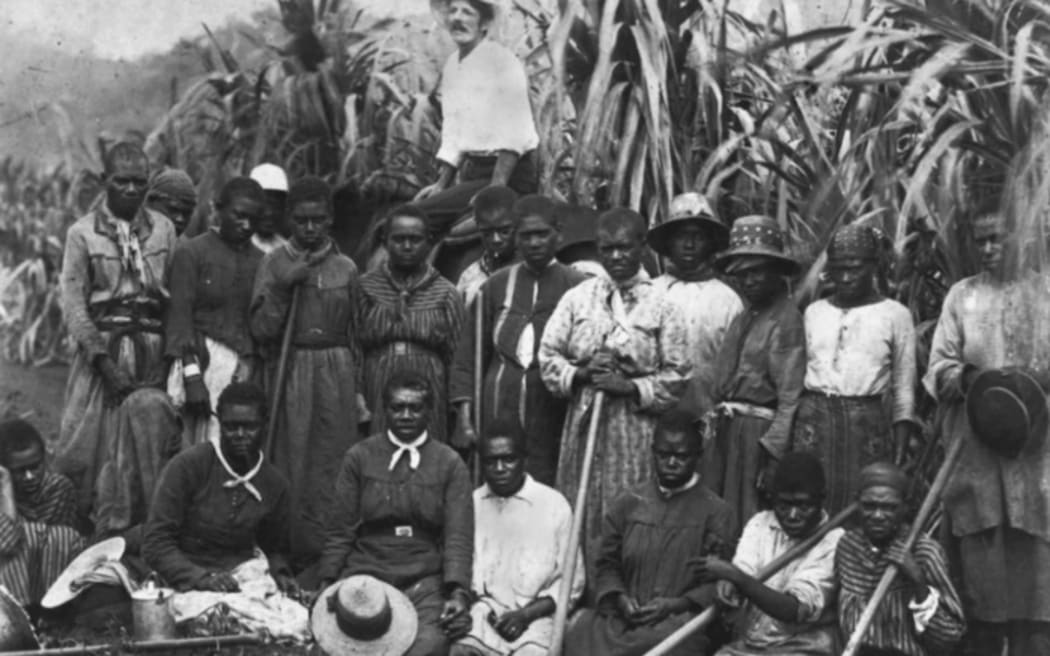 Many South Sea Islanders worked in Queensland, like these workers in Cairns.