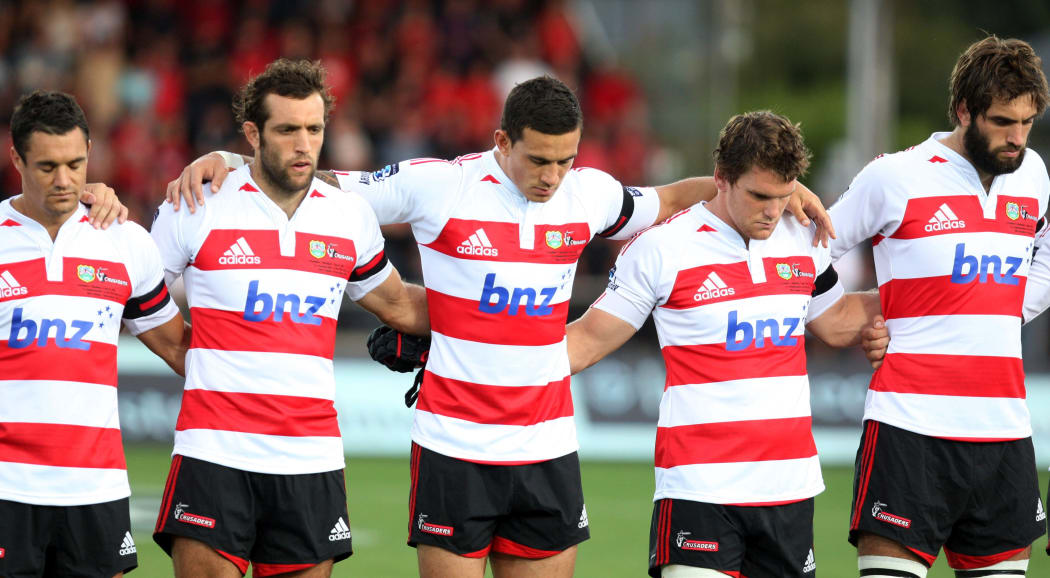 Sam Whitelock (right) and fellow Crusaders players remember the victims of the Pike River and Christchurch Earthquake ahead of a match at  Trafalgar Park in Nelson in 2011.