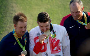 Great Britain's Justin Rose with gold, Henrik Stenson with silver and Matt Kuchar with bronze, Rio 2016 Olympics golf tournament.