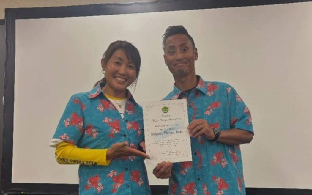 Megumi Takaku Shimada of Blue Palms Dive Service Rota, left, and Suguru Takahashi of Makesure Diving represent the CNMI—including the islands of Saipan, Tinian, and Rota—in receiving the second place award for Best Diving Area Overseas at Marine Diving Awards in Tokyo, Japan, on 4 April 2025.