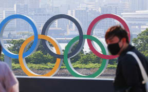 A photo shows a five-ring Olympic emblem at Odaiba Marine Park water area in Minato Ward, Tokyo on May 30, 2021.