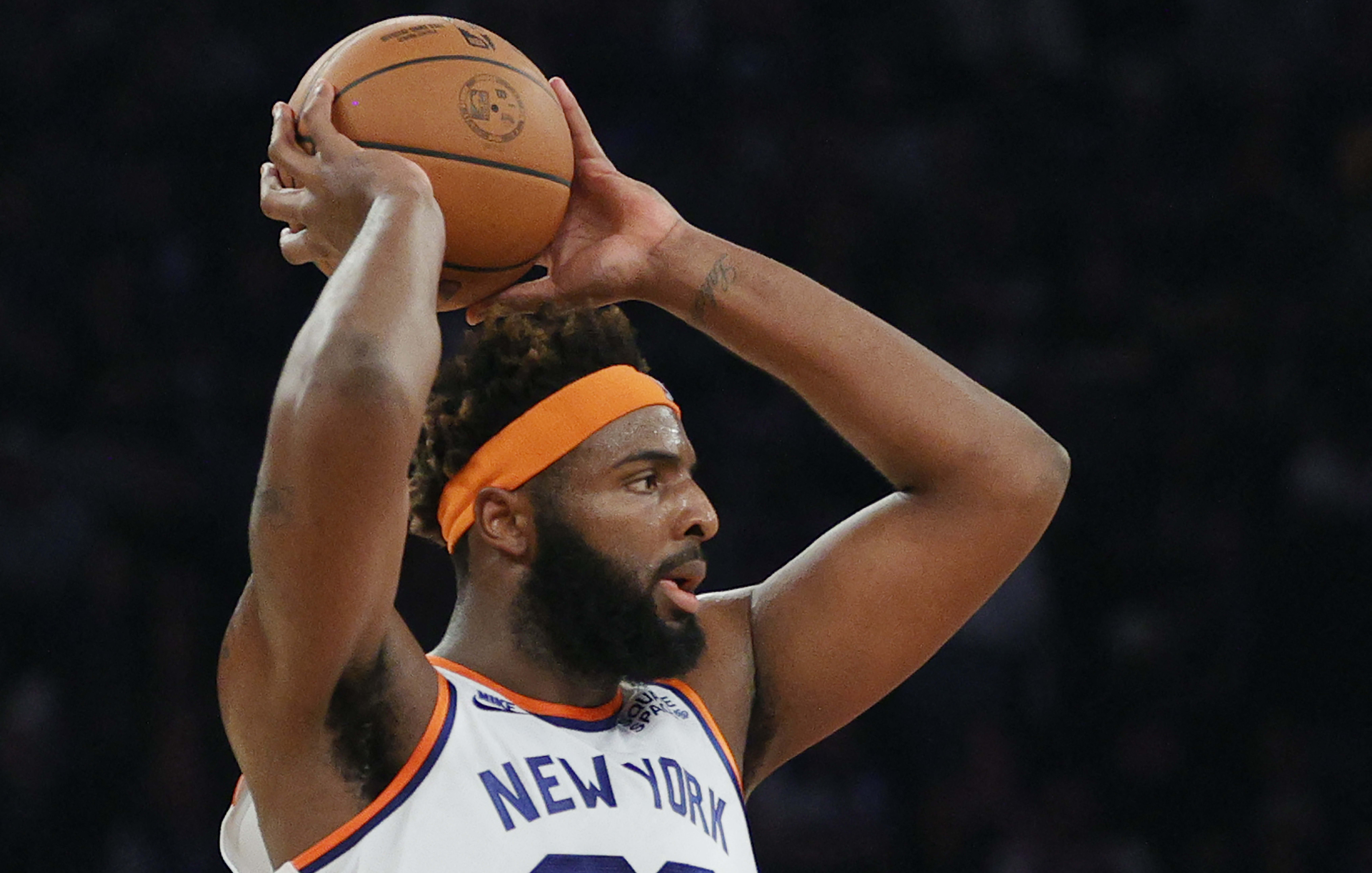 Mitchell Robinson of the New York Knicks looks to pass during the first half against the Boston Celtics at Madison Square Garden on Wednesday.
