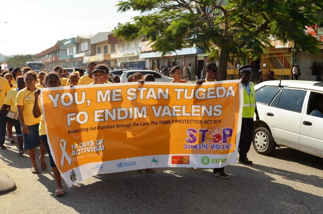Women march in Honiara to mark the beginning of 16 days of activism for the elimination of violence against Women in 2015.