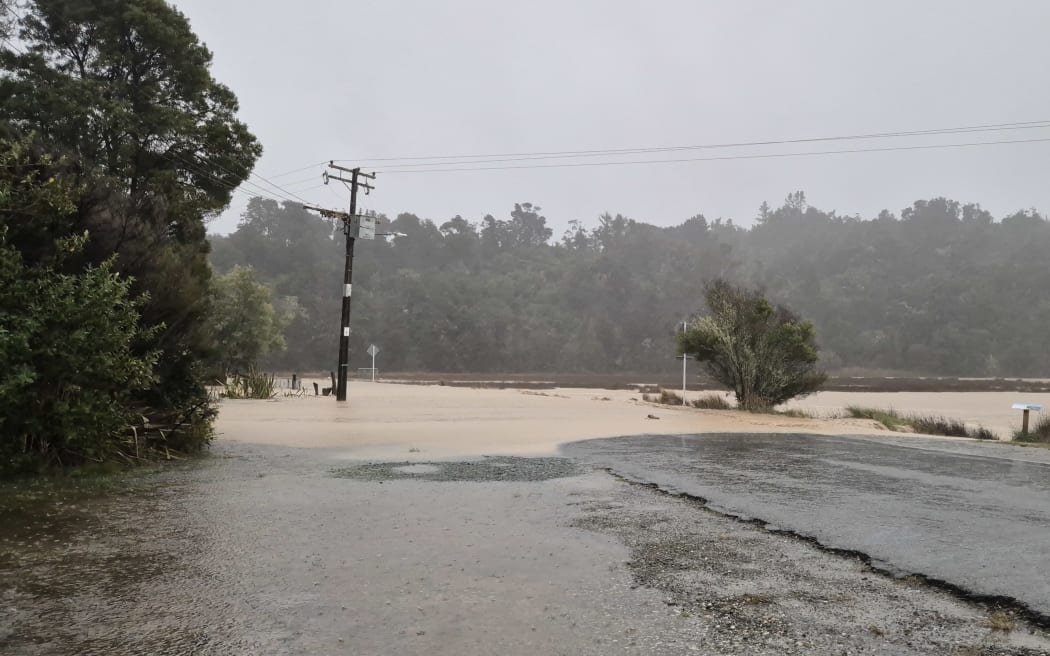 Live: Homes still without power, roads closed and trees downed