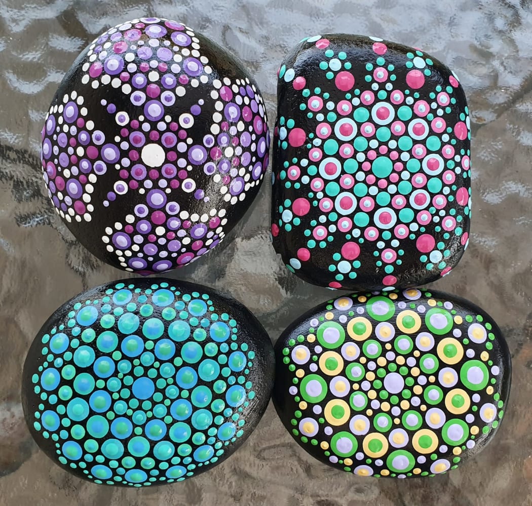 Rocks painted by Sam Manawaiti