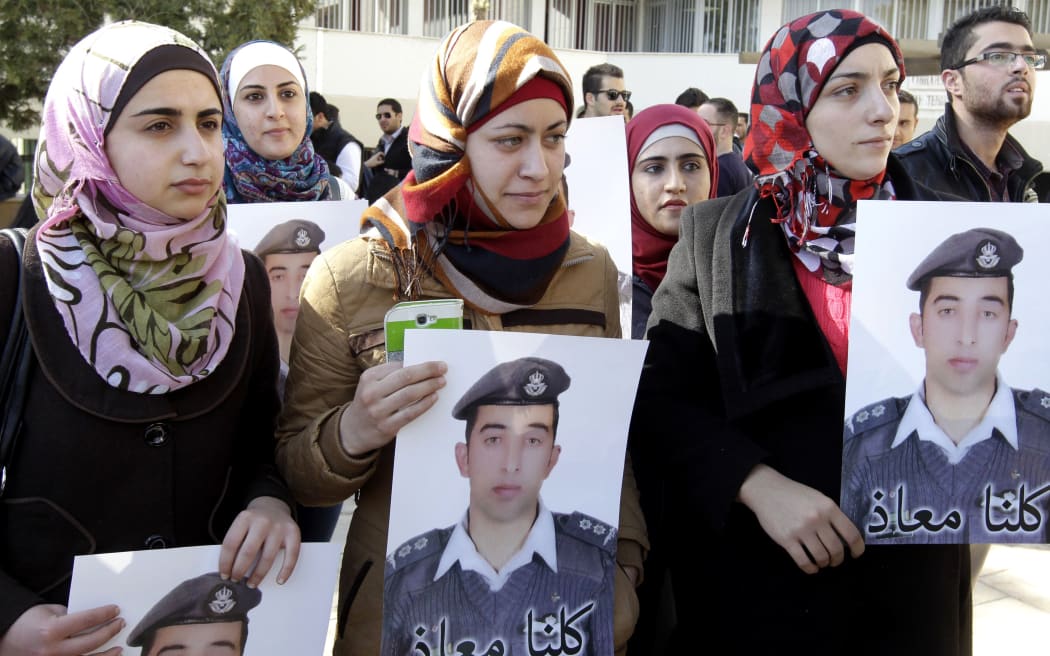 Anwar Tarawneh (centre), wife of Maaz al-Kassasbeh, at a rally in the Jordanian capital Amman on Tuesday calling for his release.
