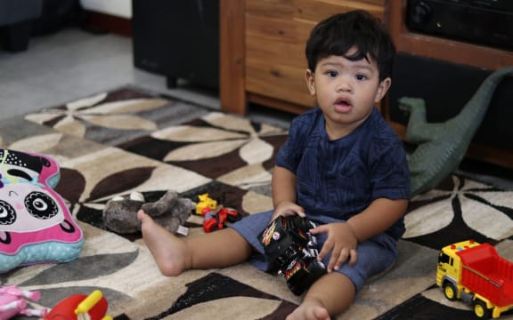 Little Frederick became big news both in NZ and Samoa after he was denied a vaccination in New Zealand before travelling home to Samoa. That is despite the NZ government sending 100,000 vaccines to the Island nation. He is being kept quarantined at his godparents home until the epidemic is over.
