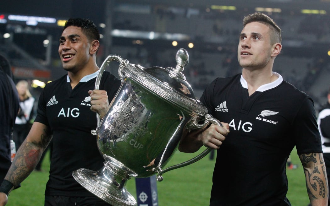 All Blacks Malakai Fekitoa and TJ Perenara celebrate 2014 Bledisloe Cup success.