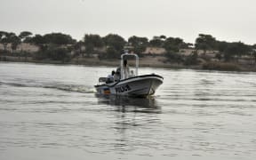 A boat of the Chadian police sails on Lake Chad which borders Chad, Nigeria, Niger and Cameroon.