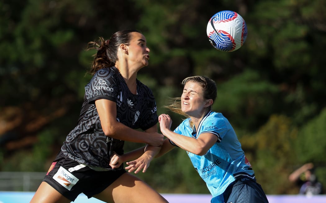 Phoenix Isabel Cox (L) with Sydney Charlotte Mclean during the A-League Women - Wellington Phoenix FC v Sydney FC at Porirua Park.
