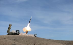 A handout picture made available by the Iranian Army office reportedly shows a Sayad missile fired from the Talash missile system during an air defence drill at an undisclosed location in Iran on November 5, 2018.