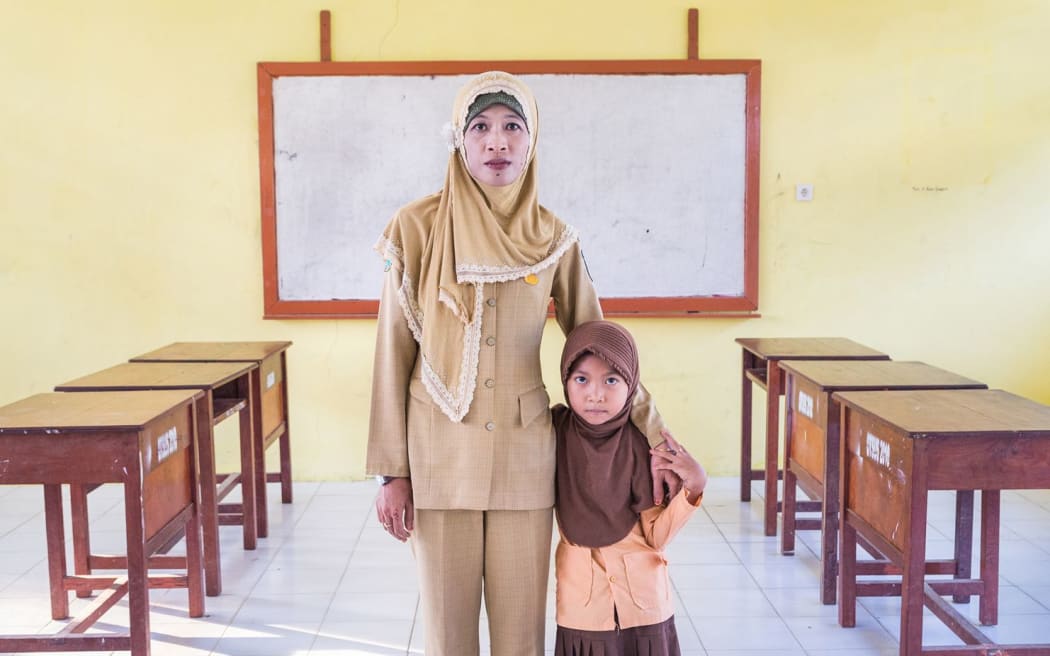 31 year old teacher school teacher Ibu Ratna is HIV positive, "Although I am HIV positive my colleagues at school continue to give me support."