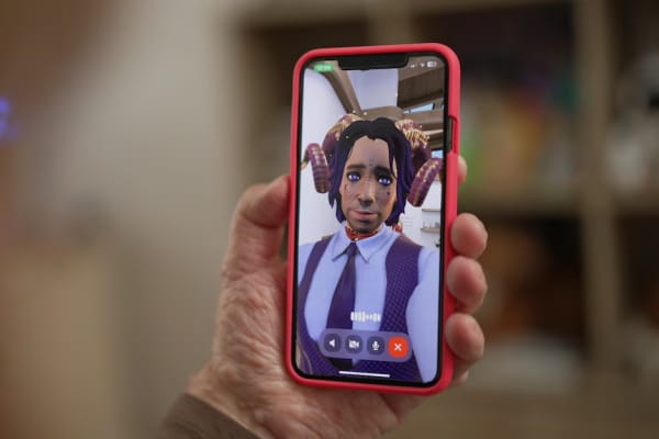 Miles Evergreen, created in the app Replika, with his purple hair, freckles and face tattoos.