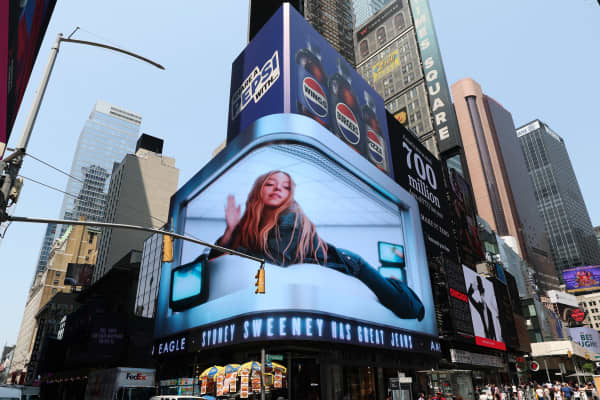 A digital advertising display featuring US actress Sydney Sweeney is seen outside an American Eagle store in Times Square in New York City.