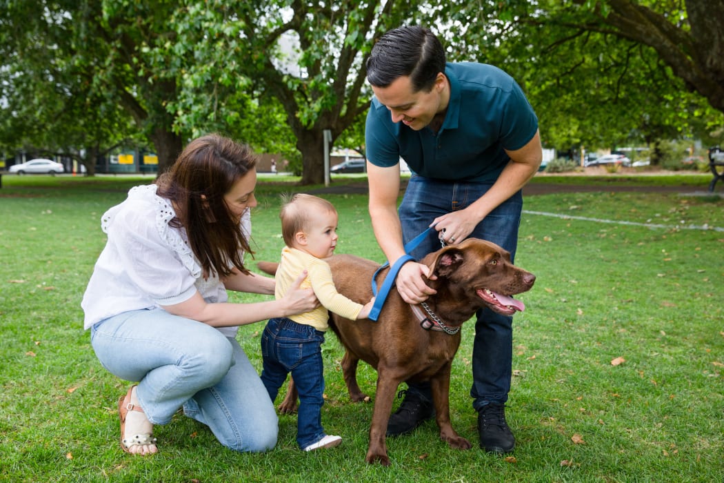 Chloe and Edward Leuschke's toddler Charlotte and chocolate labrador Bella are best friends