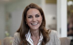 Britain's Catherine, Princess of Wales smiles during a visit to see the RHS Wellbeing Garden at Colchester Hospital in Essex, southeast England on 2 July, 2025.