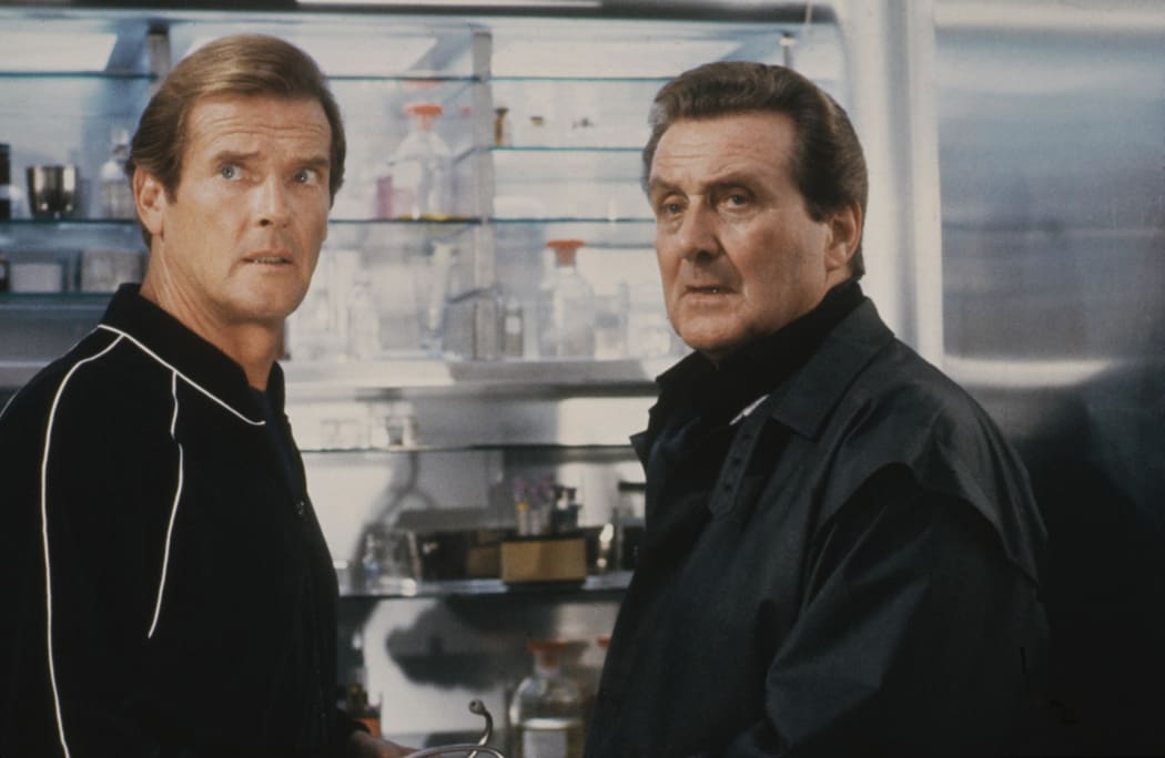 Patrick Macnee and Roger Moore in the 1985 James Bond film A View to a Kill.