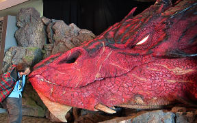 Sir Richard Taylor from Weta workshops unveils the sculpture of the dragon Smaug