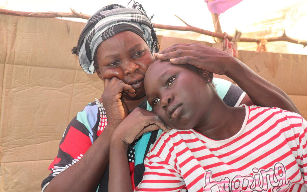 Returnee families at a transit camp in Sudan.