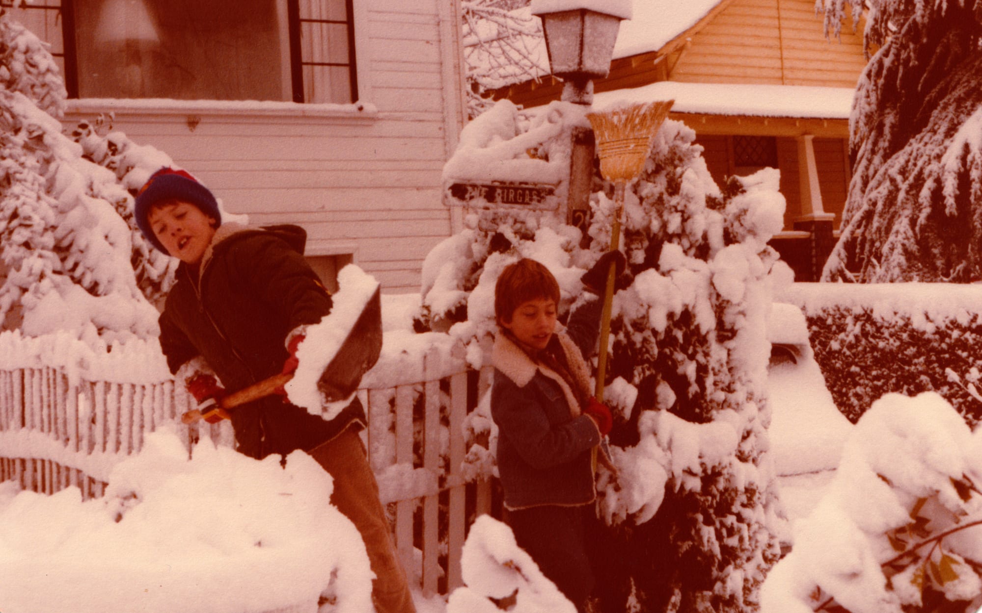 Nik Dirga as a child shovelling snow outside his family home in Nevada County