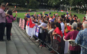 A sing-off on the steps of the New Zealand parliament between protestors and Indonesians during president Joko Widodo's visit to Wellington. 19 March 2018