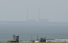 Concerns are increasing over attacks in and around the Zaporizhzhia nuclear power plant, seen here across the Dnipro river.