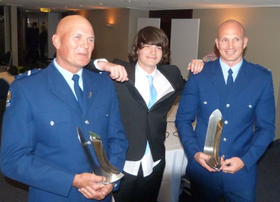 Senior Constable Bryan Farquharson, left, Joshua McQuoid and Constable Paul Bailey.
