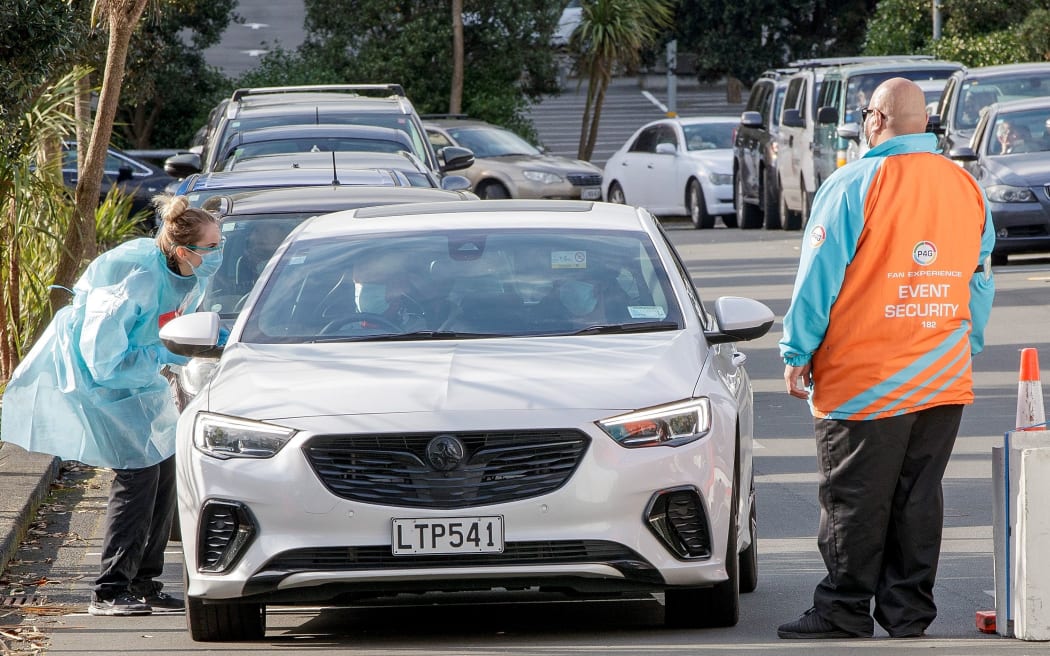 Testing being conducted by health workers at a COVID-19 testing station setup at Eden Park, National Sports Stadium, in Auckland on August 14, 2020.