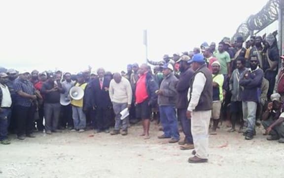 ExxonMobil officers receive a petition from landowners in Hela Province, Papua New Guinea.