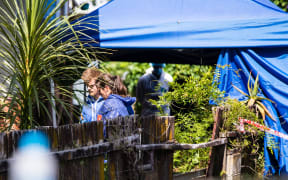 Police at murder scene in Waitaki Street, Henderson, west Auckland