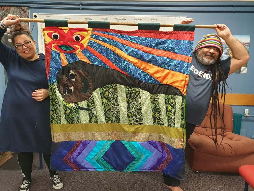 Ron Te Kawa (right) makes art from recycled and reclaimed fabric including whakapapa quilts in community halls and marae.