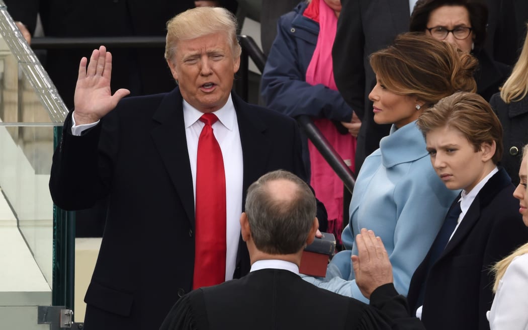 Donald Trump is sworn in as the 45th US president by Supreme Court Chief Justice John Roberts.