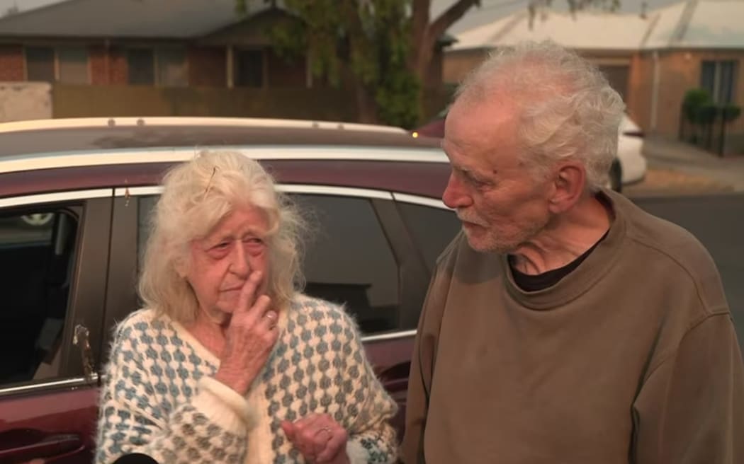 Christine and Bjorn Holm were waiting to hear if their home was OK as the fire threatened Gellibrand.