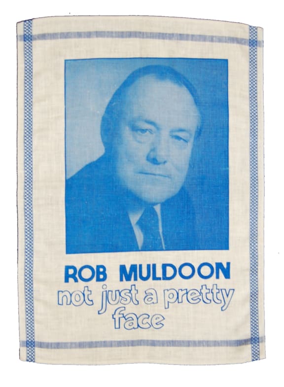 Tea Towel with a Rob Muldoon portrait that says 'Not just a pretty face'.