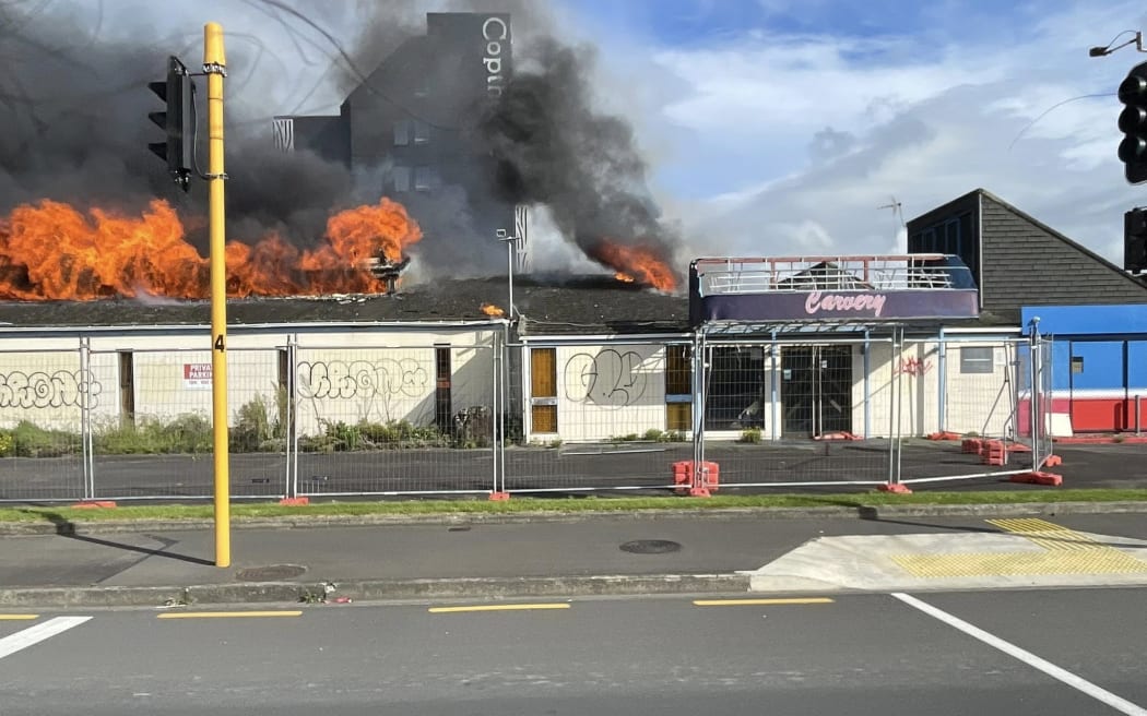 Fire and Emergency are responding to a large fire at the old Fitzherbert Tavern on Ferguson Street in Palmerston North.