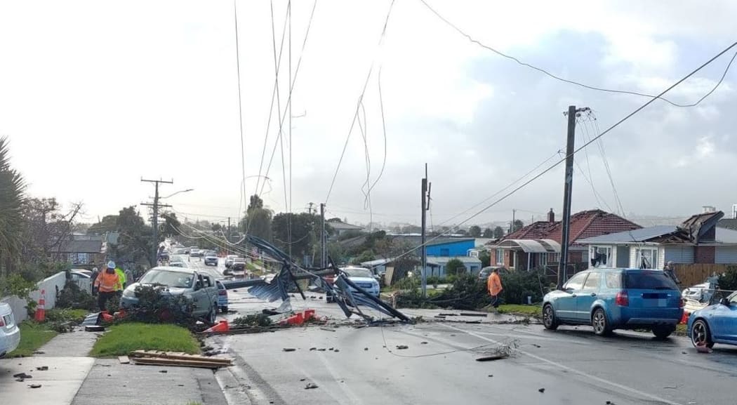 Downed powerlines and damaged roofs after yesterday's tornado.