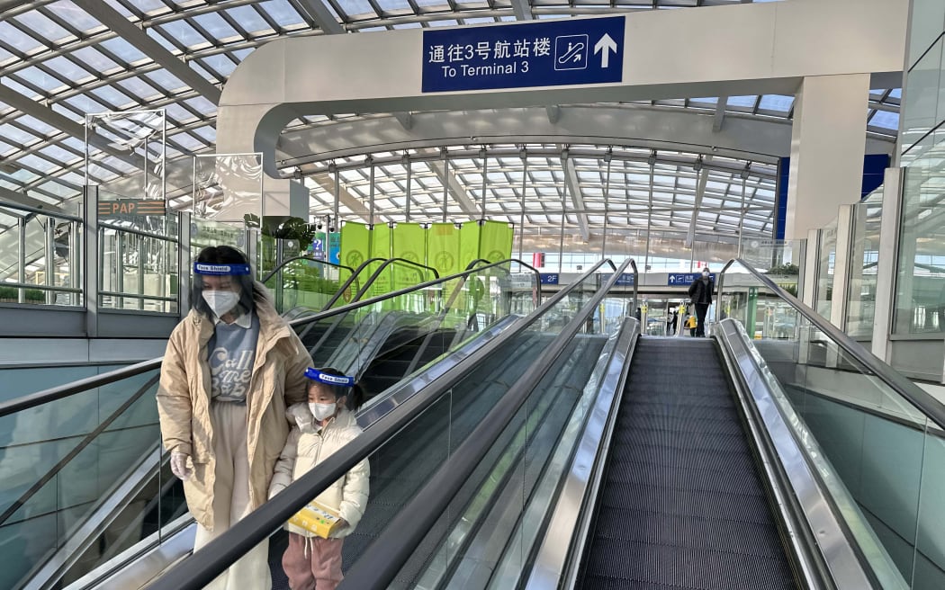 Few passengers are seen at Beijing Capital International Airport in China on Dec. 27, 2022. The Chinese government will drop Covid-19 quarantine requirements for international travelers arriving from abroad from January 8th. next year.  ( The Yomiuri Shimbun ) (Photo by Ichiro Ohara / Yomiuri / The Yomiuri Shimbun via AFP)