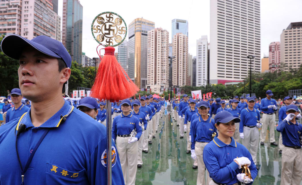 Falun Gong members prepare for a pro-democracy rally in Hong Kong on July 1, 2013.
