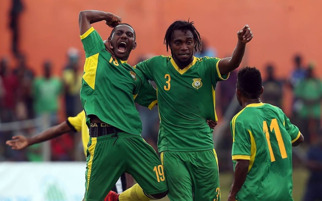 Vanuatu celebrate a goal against Papua New Guinea.