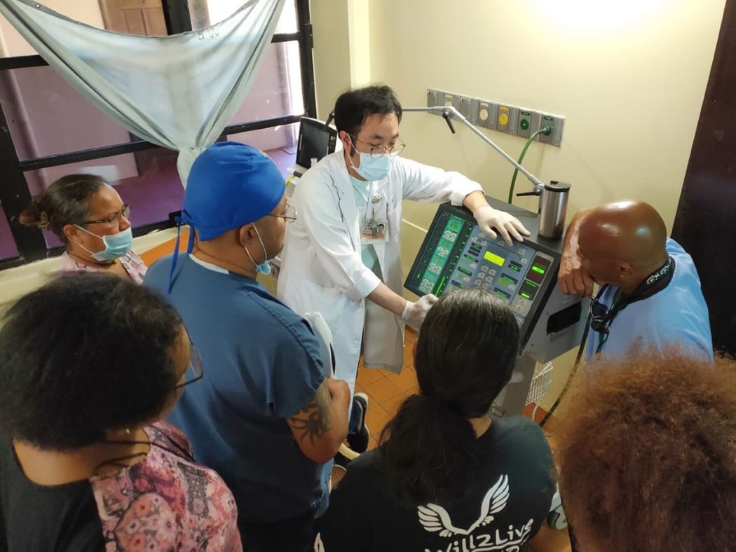 Taiwanese expert trains Palau health workers to enable capacity to do local testing.