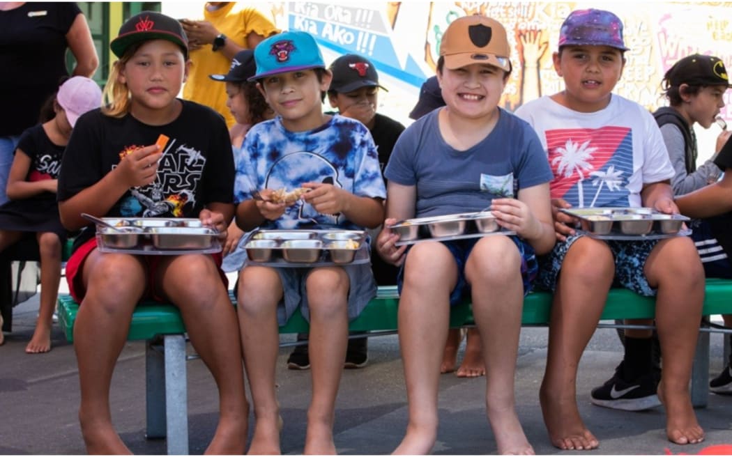 Flaxmere Primary School students enjoying a school lunch.
