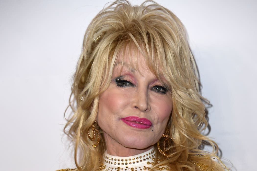 US singer-songwriter and 2019 MusiCares Person Of The Year Dolly Parton arrives for the 2019 MusiCares Person Of The Year gala at the Los Angeles Convention Center in Los Angeles on February 8, 2019. (Photo by Valerie MACON / AFP)