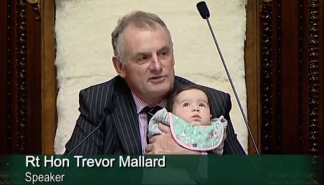 The Speaker Trevor Mallard holds Labour MP Willow-Jean Prime’s three-month old baby Heeni while MPs debate a bill to extend paid parental leave.