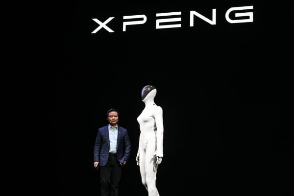 He Xiaopeng, cofounder and chairman of Chinese electric vehicle maker Xpeng, launches Xpeng's next-gen Iron humanoid robot during AI Day press conference at its headquarter in Guangzhou, in southern China's Guangdong province on 5 November, 2025.