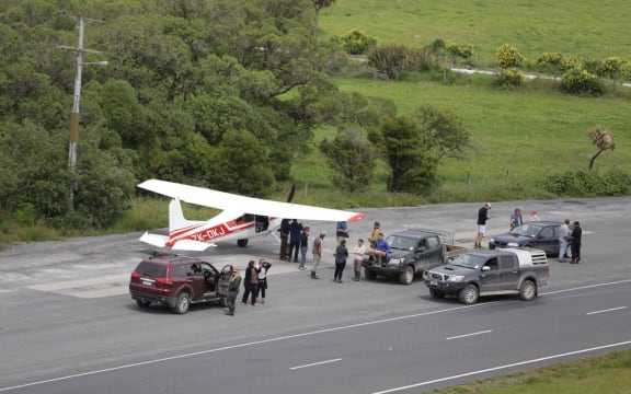 A Southland man flew to the area to check on friends and family, landing on State Highway 1.