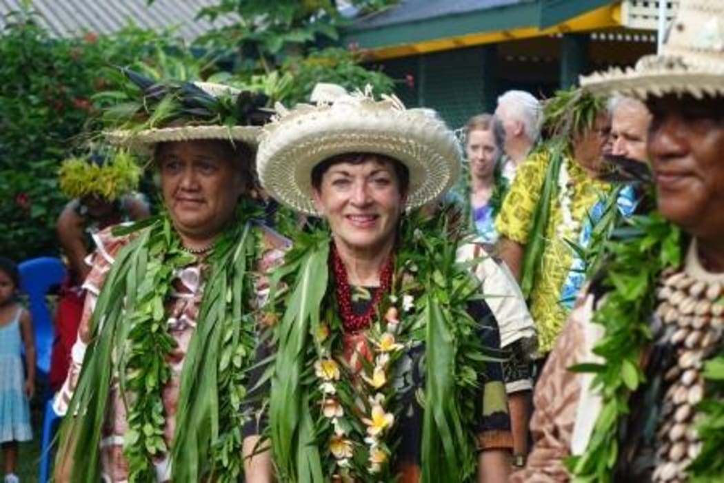 The Governor General is adorned with garlands at Atupare Marae