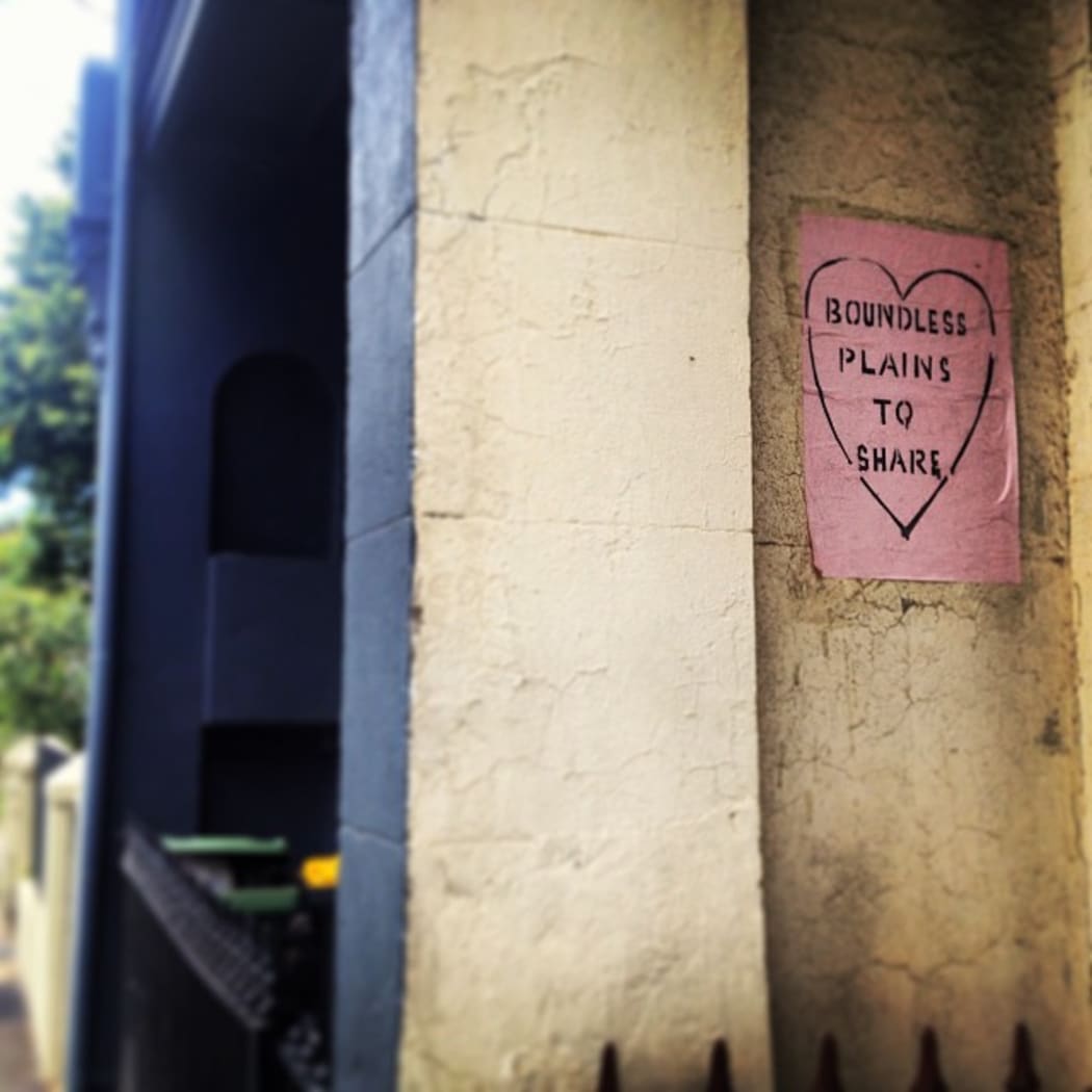 A poster with the words "boundless plains to share" in a love heart