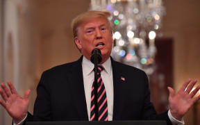 US President Donald Trump speaks about his Senate impeachment trial in the East Room of the White House in Washington, DC, February 6, 2020.