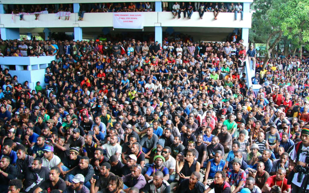 UPNG students gather on campus.